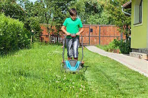 Kid Mowing the Lawn