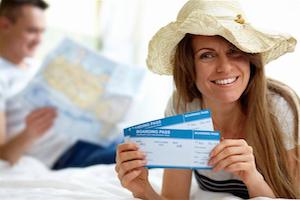 Women holding travel tickets