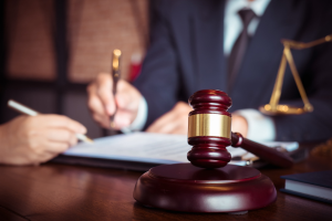 Lawyer signing documents